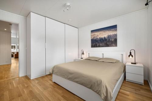 Moderne enebolig客房内的一张或多张床位