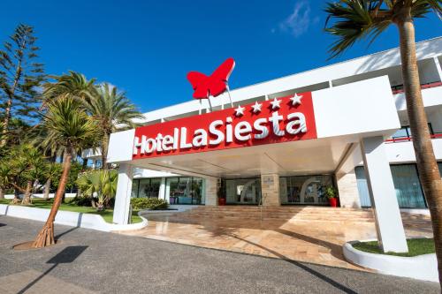 美洲海滩Alexandre Hotel La Siesta的红鸟的卡西塔酒店