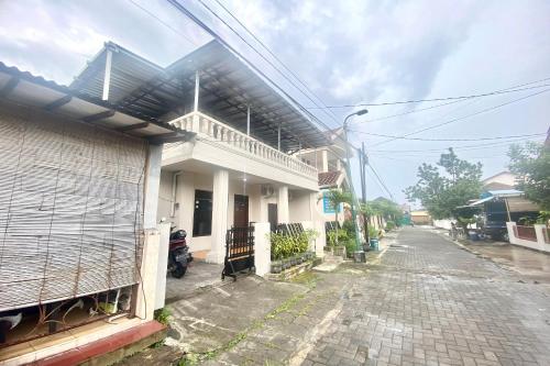 SPOT ON 93717 Nayus Homestay Syariah 4平面图