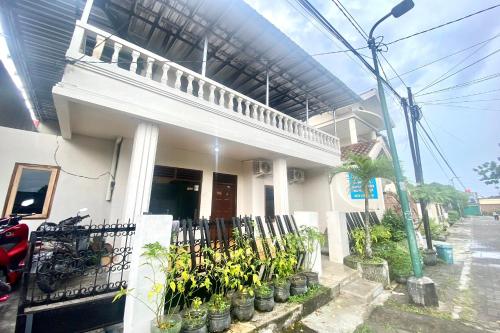 SPOT ON 93717 Nayus Homestay Syariah 4平面图