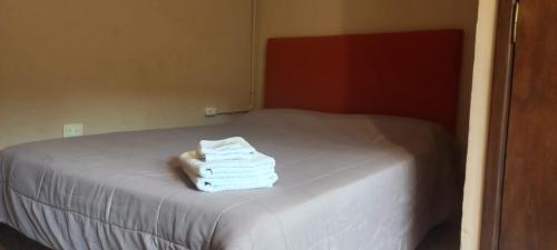 La Morada Hostal客房内的一张或多张床位