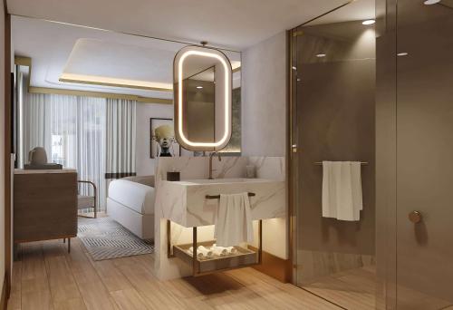 安卡拉Boreas Hotel, Trademark Collection by Wyndham的浴室设有白色水槽和镜子