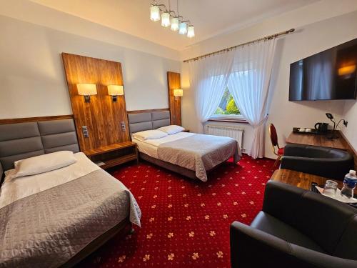 比得哥什哈瓦那酒店的酒店客房设有两张床和电视。