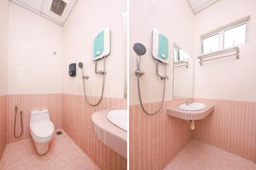 马六甲Nexus Hotel的带淋浴、卫生间和盥洗盆的浴室