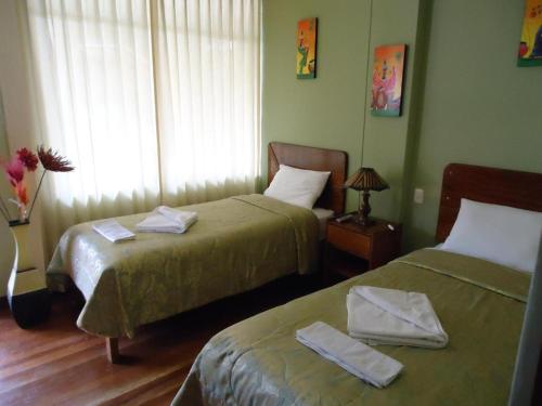 奇拉坤特酒店客房内的一张或多张床位