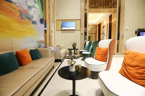 Hanting Hotel Jinan High-tech Zone Wanda Plaza的休息区