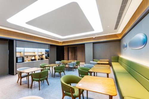 Ji Hotel Suzhou Guanqian Street Ganjiang Xi Road餐厅或其他用餐的地方