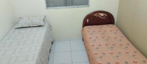 Apartamento Pico da Bandeira客房内的一张或多张床位