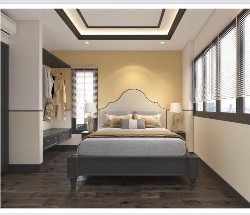 会安会安之家旅馆的一间卧室配有一张床和天窗