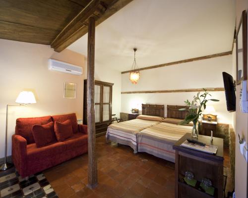 Hotel Boutique La Morada de Juan de Vargas客房内的一张或多张床位