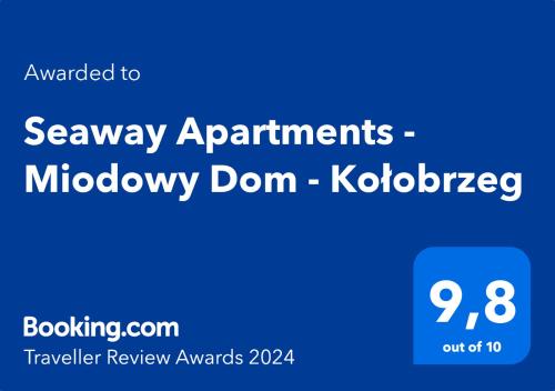 科沃布热格Seaway Apartments - Miodowy Dom - Kołobrzeg的蓝标,用单词asonay约会,不记名的圆顶生物技术