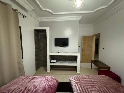 Hotel Ahmed Ali客房内的一张或多张床位