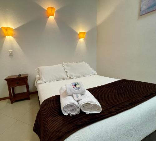 Hotel Oasis de la villa客房内的一张或多张床位