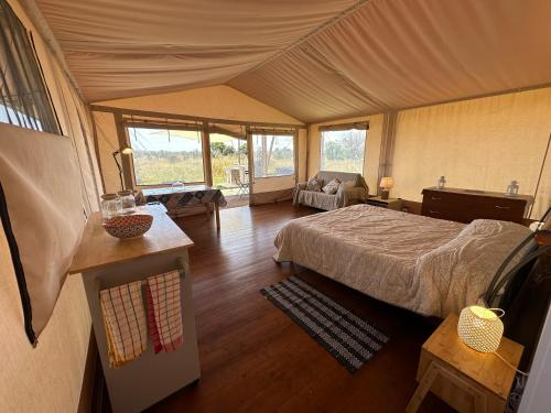 梅林Villa Diana的帐篷内的一个床位房间