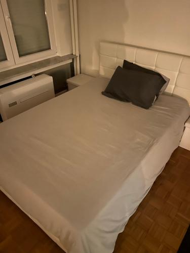 Flat @Mechelen centrum客房内的一张或多张床位
