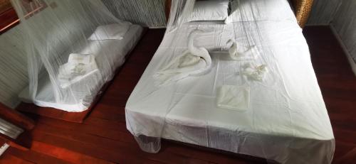 Dreamer Resort客房内的一张或多张床位