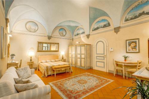 Firenze Suite客房内的一张或多张床位