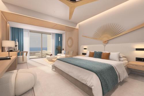 耶奥伊乌波利斯Ventale Island Breeze Resort的一间卧室设有一张大床,享有海景