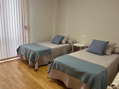 VIVE HOME Vilanova de Arousa客房内的一张或多张床位