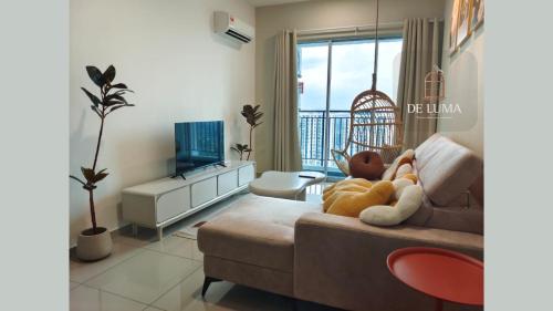 大山脚De Luma-Metropol 3Bedrooms的带沙发和电视的客厅