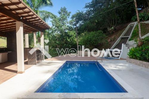 Charmosa casa com piscina em Marechal Floriano内部或周边的泳池