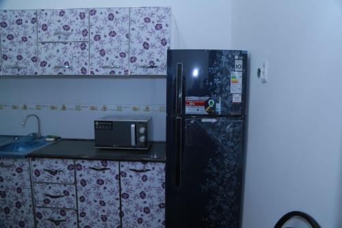 Mir hostel的厨房或小厨房