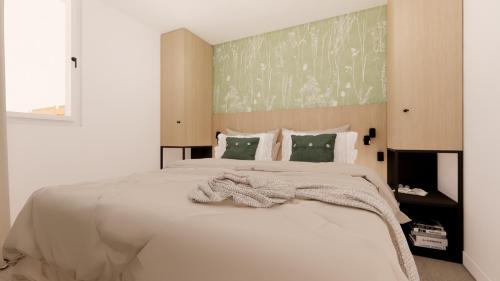 韦斯特卡佩勒Vakantiewoning Westkapelle Piet Mondriaanpad 3的卧室配有一张带毯子的大型白色床