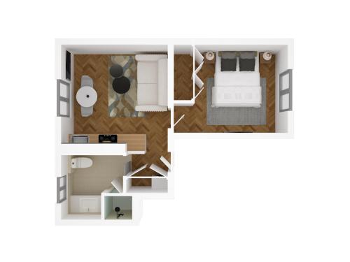 布洛涅-比扬古Suite Deluxe 2 by Les Maisons de Charloc Homes的一间卧室的平面图