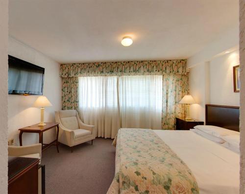 Jamaica Punta del Este Hotel & Residence客房内的一张或多张床位