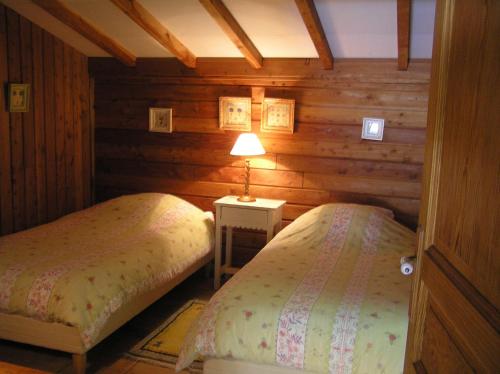 Residences Du Golf Des Roucous客房内的一张或多张床位