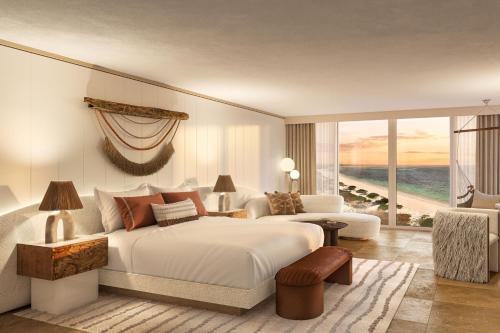 Cockburn HarbourSalterra, a Luxury Collection Resort & Spa, Turks & Caicos 的一间卧室设有一张大床和一个大窗户