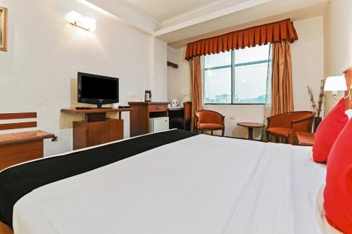 Hotel Royal Empire客房内的一张或多张床位