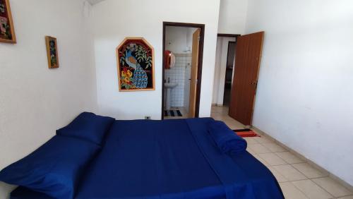 Maré Alta Hostel客房内的一张或多张床位