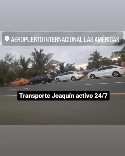 圣多明各transporte Joaquín me dedico al servicio de taxi desde el Aeropuerto las Américas a todas partes del país的美洲国际汽车标志