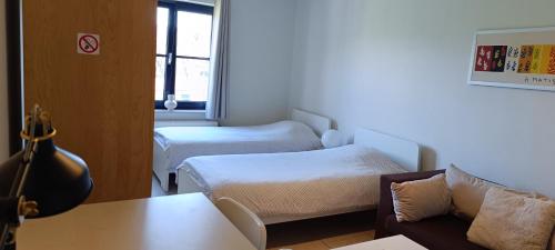 1 2 (Want To) Stay - Furnished business apartments客房内的一张或多张床位