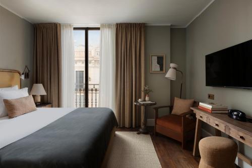 巴塞罗那Borneta的一间设有大床和窗户的酒店客房
