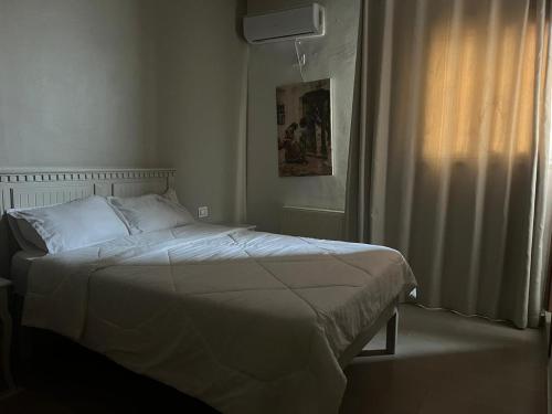 Hotel Transatlantique Tunis客房内的一张或多张床位