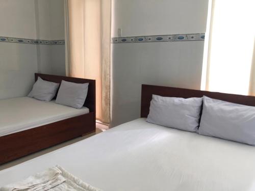 Nam Dương 1 Hotel客房内的一张或多张床位