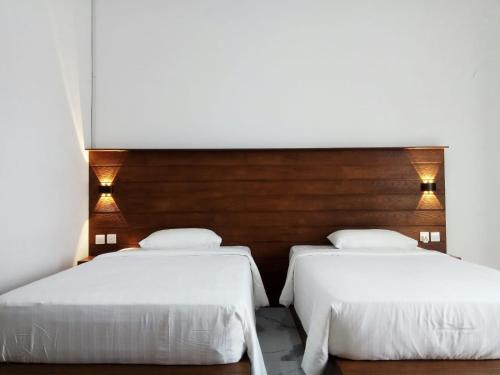 Awandari Resort & Convention客房内的一张或多张床位