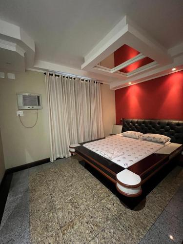 Motel Vitoria Reggia客房内的一张或多张床位