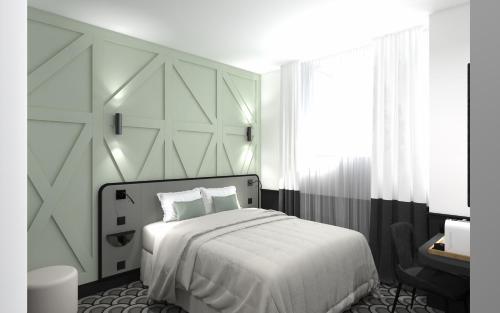 第戎Logis Hotel Darcy Dijon Centre的白色卧室配有床和书桌