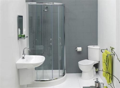 卡图纳耶克OYO KINGS HOTEL的带淋浴、盥洗盆和卫生间的浴室