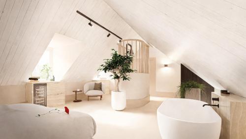 多克姆Hotel de ABDIJ Dokkum的客厅配有白色家具和拱形天花板