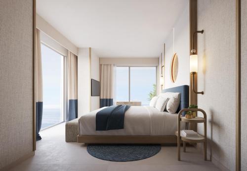 坎昆AVA Resort Cancun - All Inclusive的一间卧室设有一张大床和一个大窗户