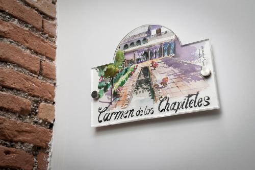 格拉纳达Hotel Casa Palacete Tablas的一座建筑的图片,上面写着“城市的改变”