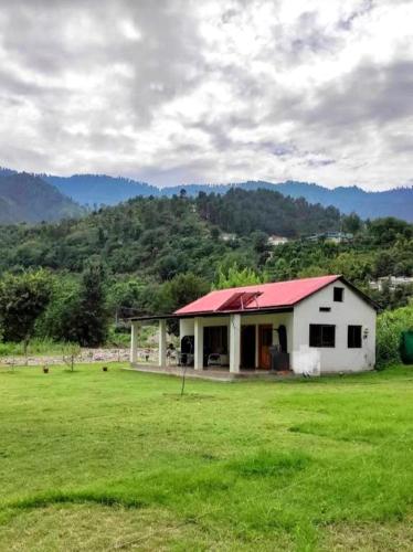 Country Club Balakot - Round Bed Cottage