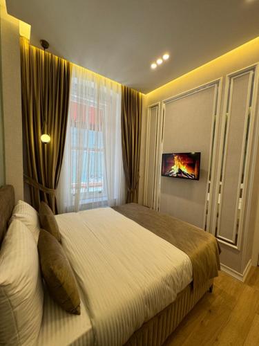 The Aramis Galata Hotel客房内的一张或多张床位