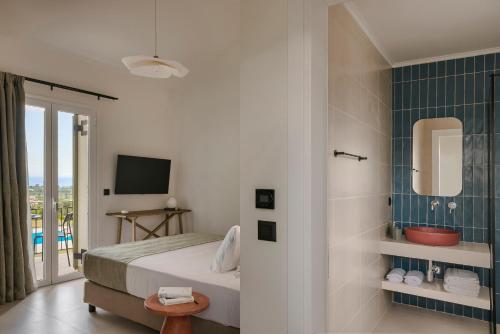 卡拉瓦杜斯罗迪一室公寓的一间酒店客房 - 带一张床和一间浴室