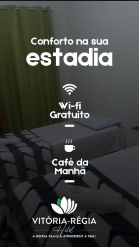 BrasiléiaHOTEL Vitoria Regia的一张写着新星的标志和三张床