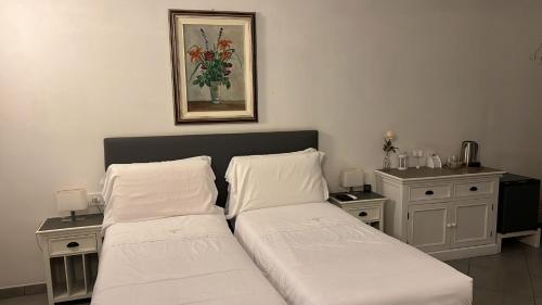 La Terrazza Vercelli Bed & Charme客房内的一张或多张床位